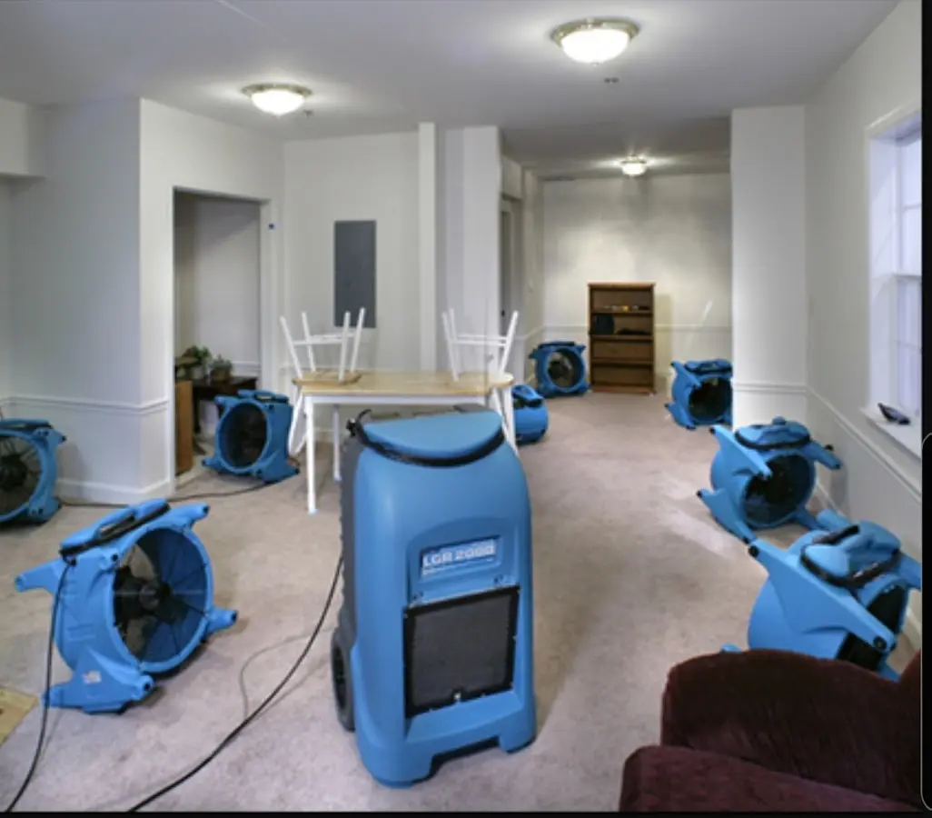 Air movers and dehumidifier setup for Water Damage Restoration in Lochearn